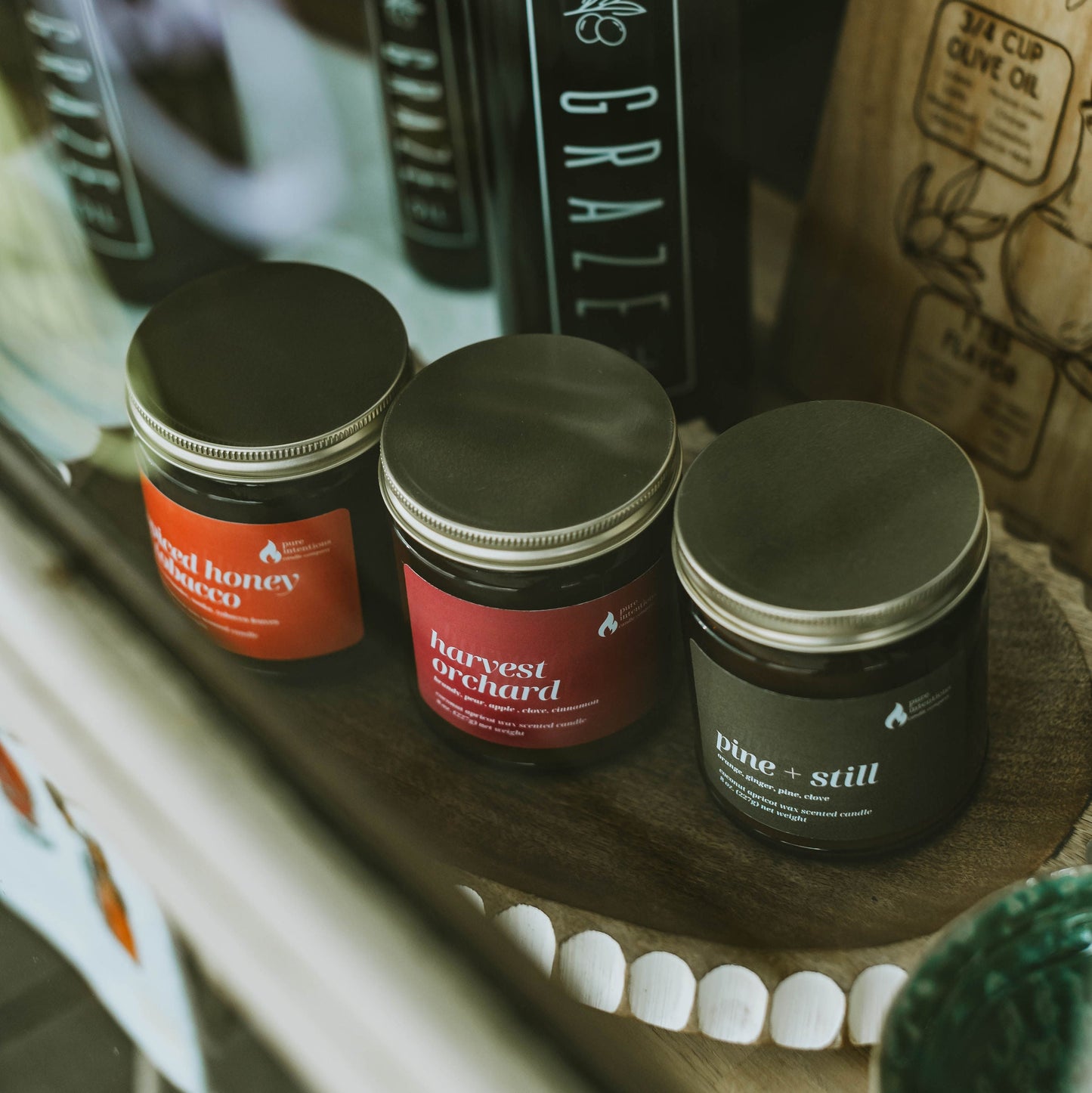Jars with labels on a wooden surface with a blurred background