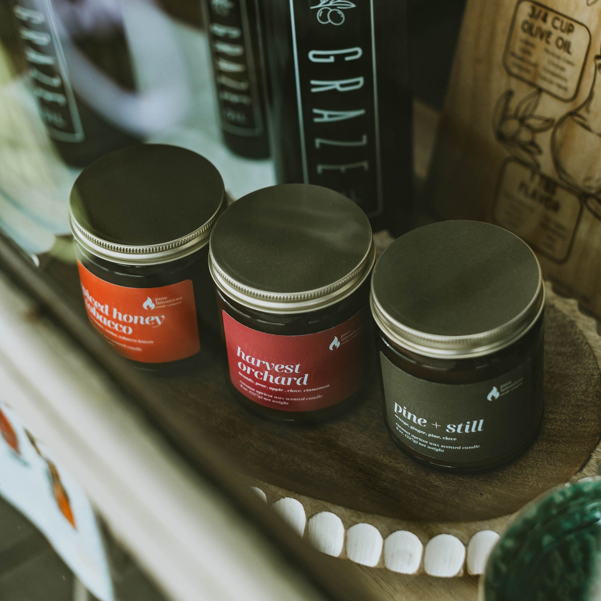 Jars with labels on a wooden surface with a blurred background